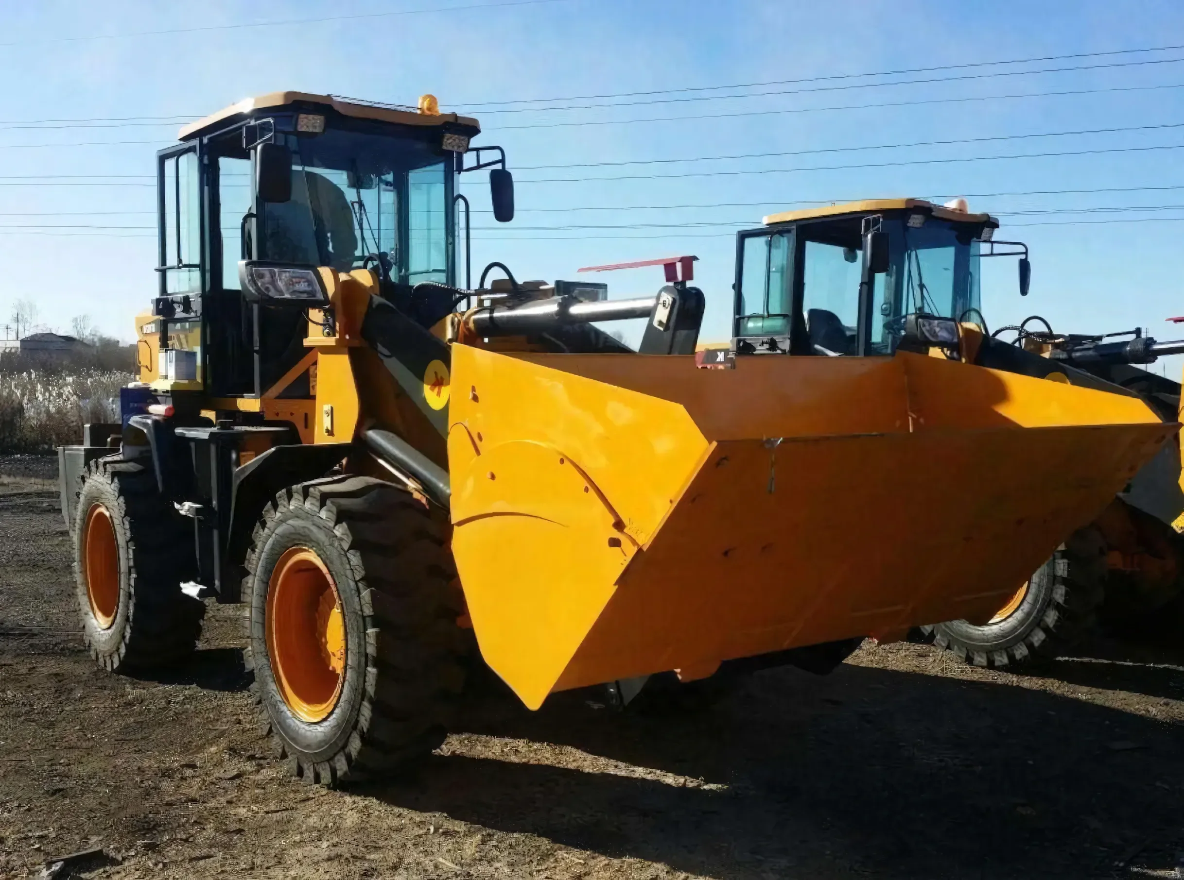 Фронтальный погрузчик МТК 960 — фото